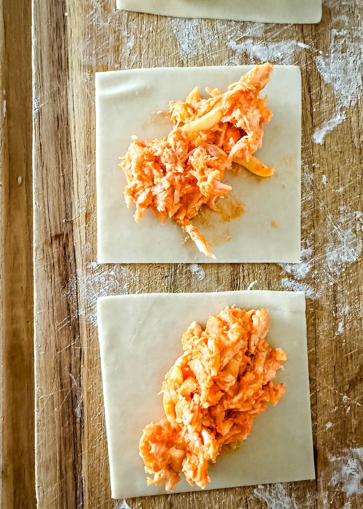 Making buffalo chicken blasts in wonton wrappers