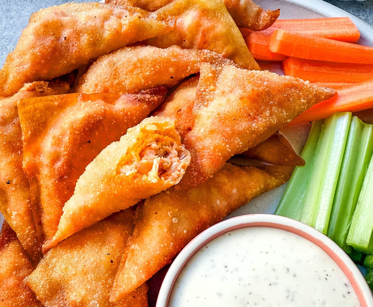 Buffalo Blasts are a crispy, spicy, and flavorful appetizer that combines tangy buffalo chicken and cheese in golden fried pockets. These bite-size appetizers made with a blend of melted cheese, tender chicken, and zesty buffalo sauce, are wrapped in wonton wrappers and fried to golden perfection. These popular Cheesecake Factory Buffalo Blasts are a super popular appetizer.