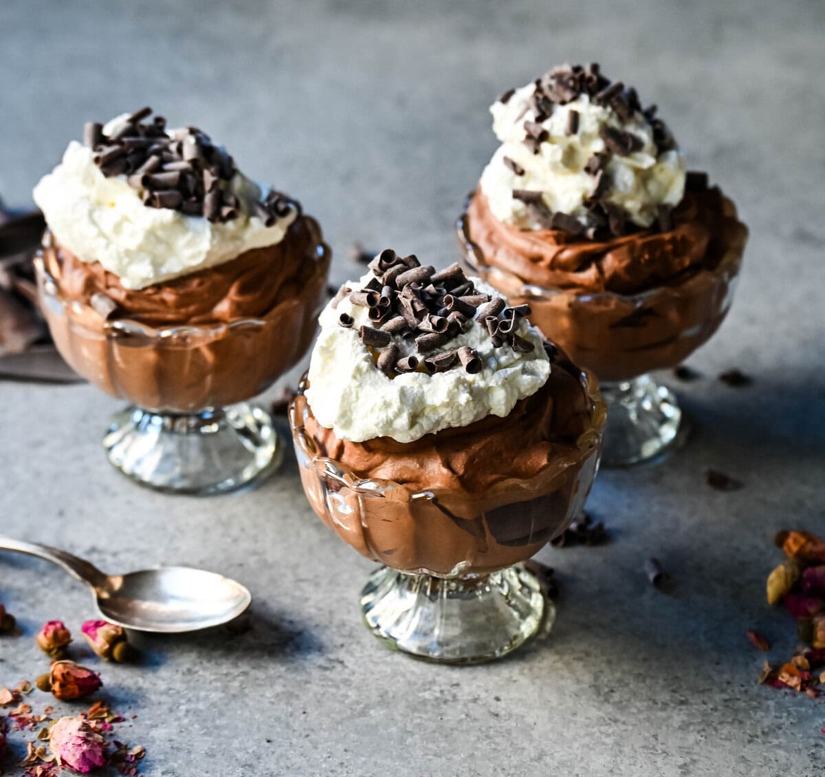 This chocolate mousse recipe is a rich and decadent chocolate dessert but is super simple to make. This is a quick and easy chocolate mousse recipe without eggs and relying on whipped heavy cream for a light and airy texture. This is the best chocolate mousse recipe!