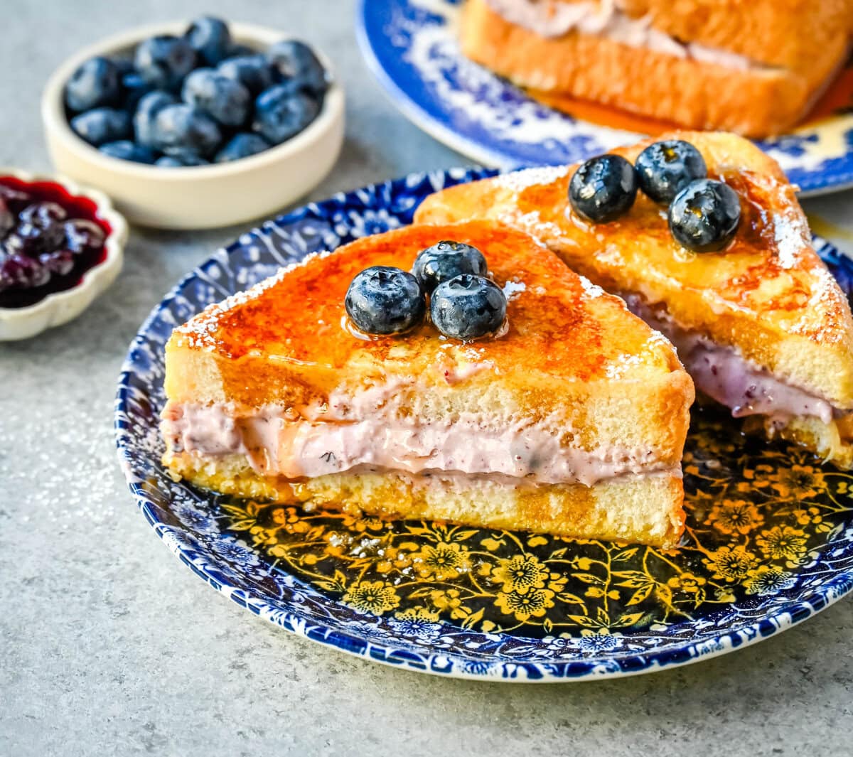 Blueberry Cheesecake Stuffed French Toast. This Blueberry Cream Cheese Stuffed French Toast Recipe is made with soft, thick bread stuffed with a homemade blueberry cream cheese and dipped in a vanilla custard batter and cooked until golden. 