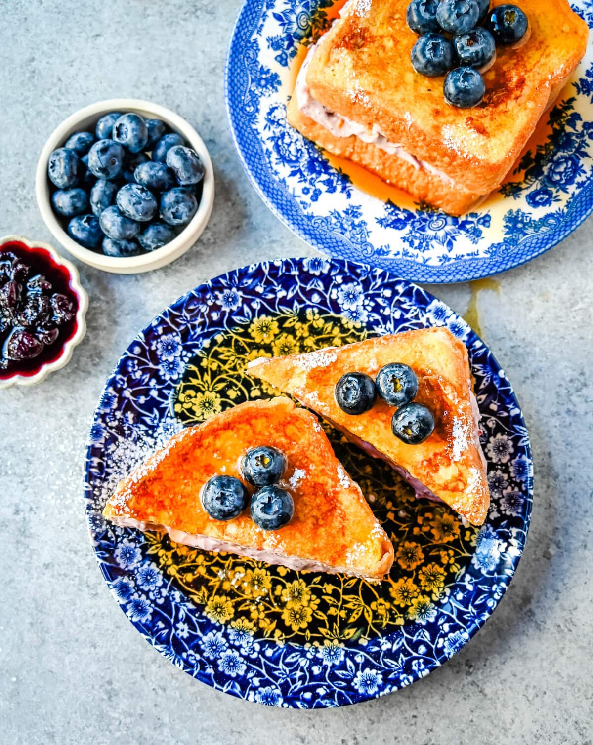 Blueberry Cheesecake Stuffed French Toast. This Blueberry Cream Cheese Stuffed French Toast Recipe is made with soft, thick bread stuffed with a homemade blueberry cream cheese and dipped in a vanilla custard batter and cooked until golden. 