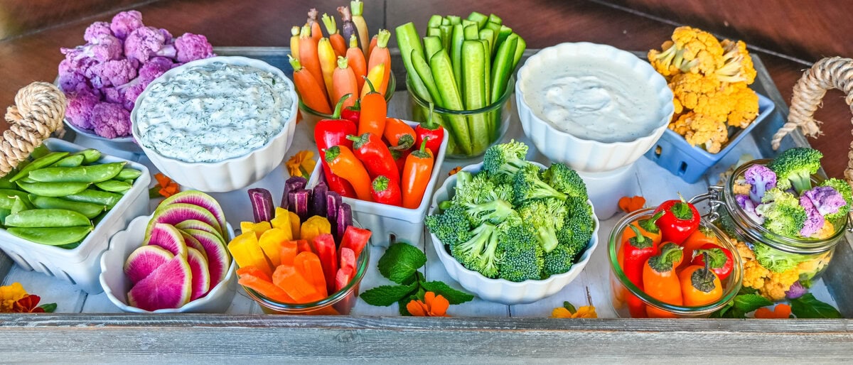 How to create a beautiful crudite platter also known as a vegetable platter, veggie tray or veggies and dips. Ideas on what vegetables to use and what dips to pair with vegetables.