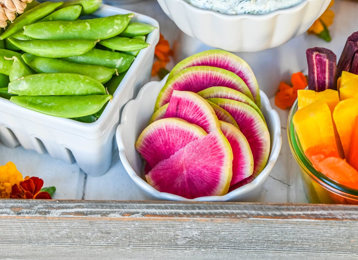 Rainbow radishes on crudite platter or veggie board.