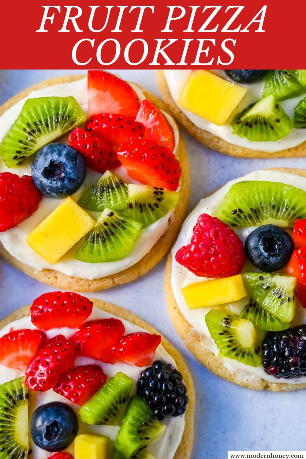 These Fruit Pizza Cookies are made with soft, chewy, buttery sugar cookies topped with a sweet cream cheese frosting and fresh fruit. These Sugar Cookie Fruit Pizzas are always a huge hit!